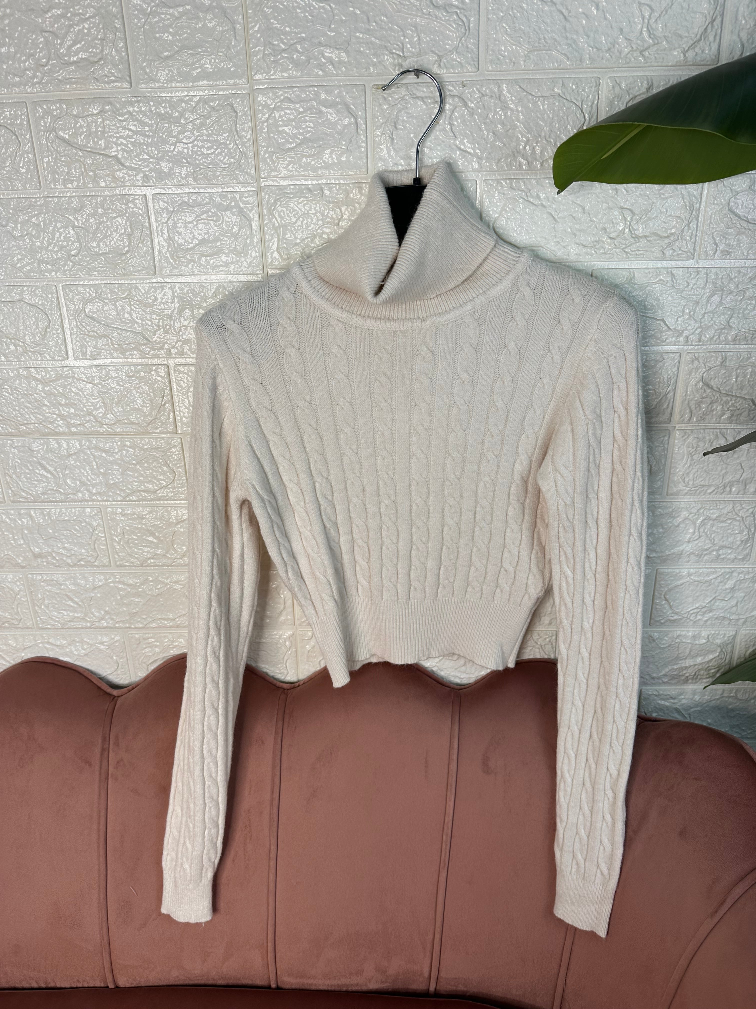 Maglia collo alto trecce