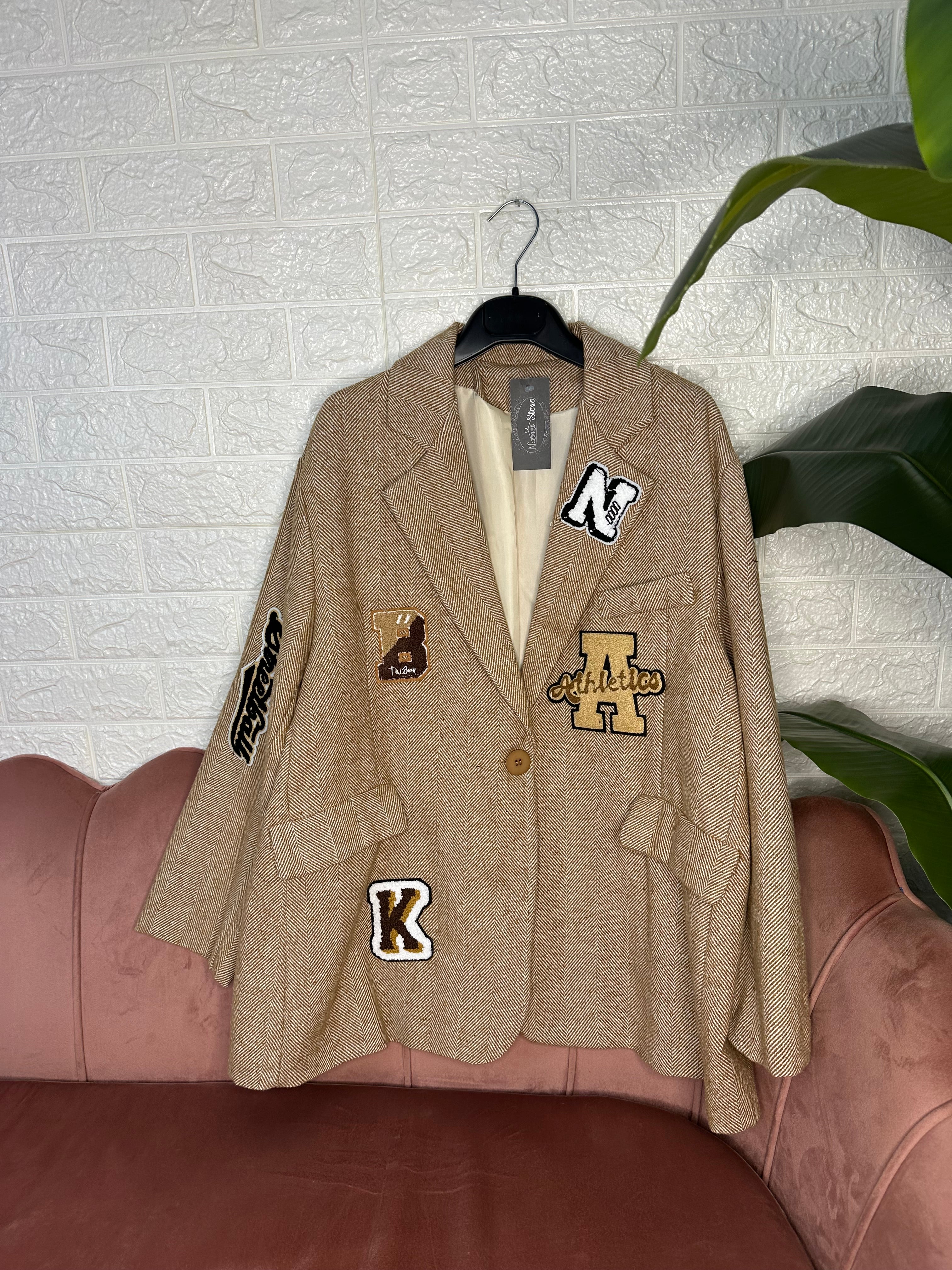 Blazer spigato stemmi