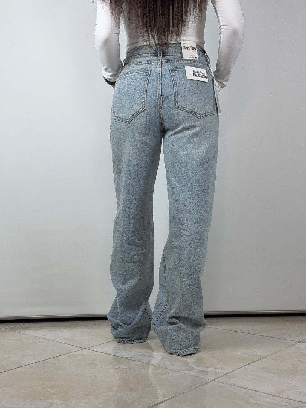 Jeans bottoni