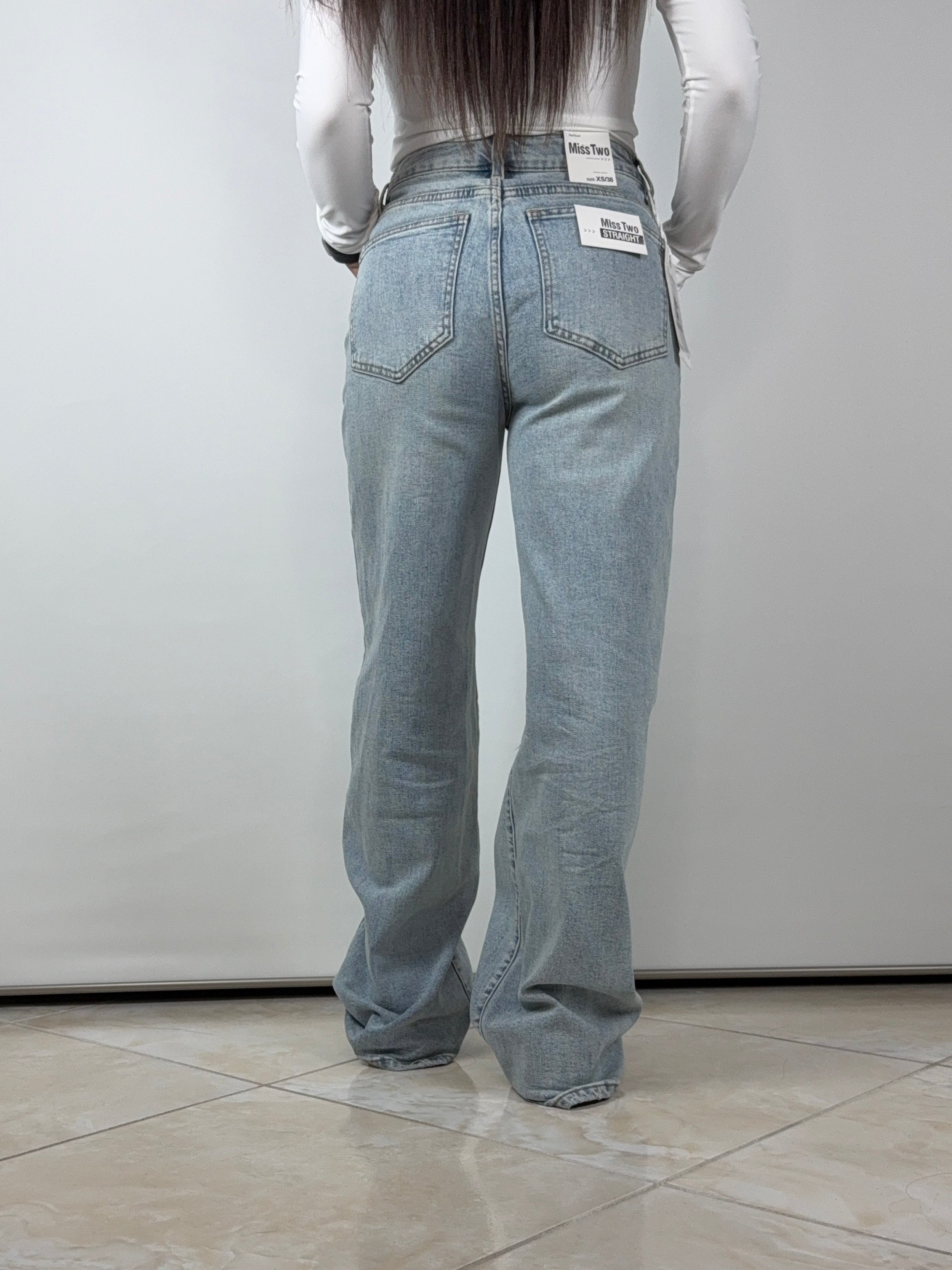 Jeans bottoni