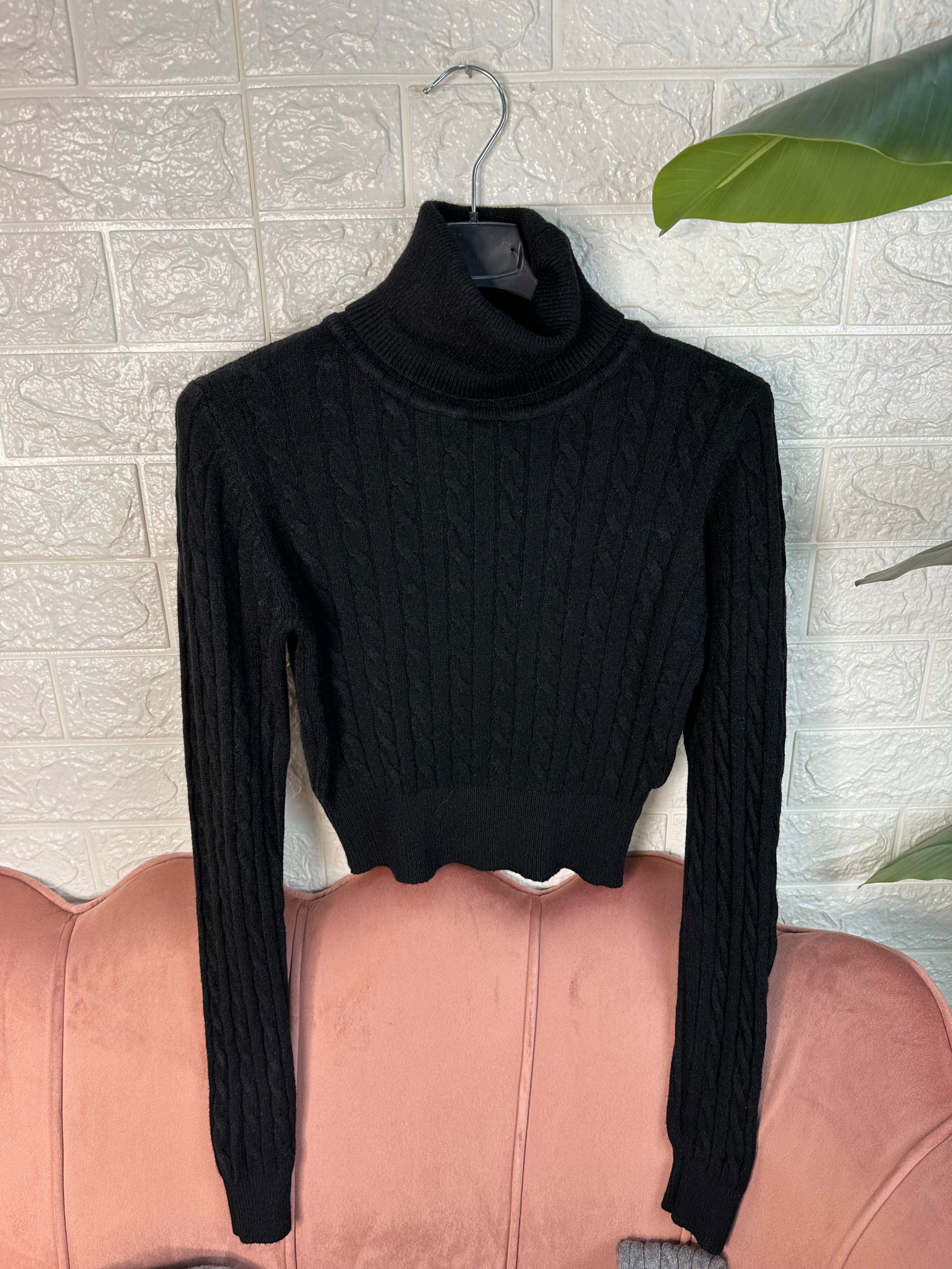 Maglia collo alto trecce